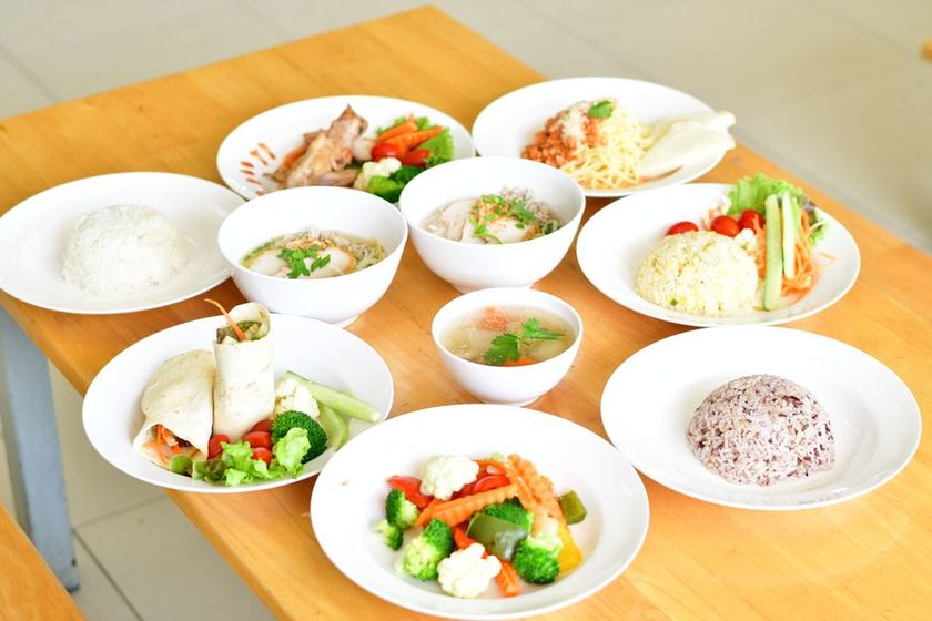 A balanced plate with vegetables, grains, and a protein source